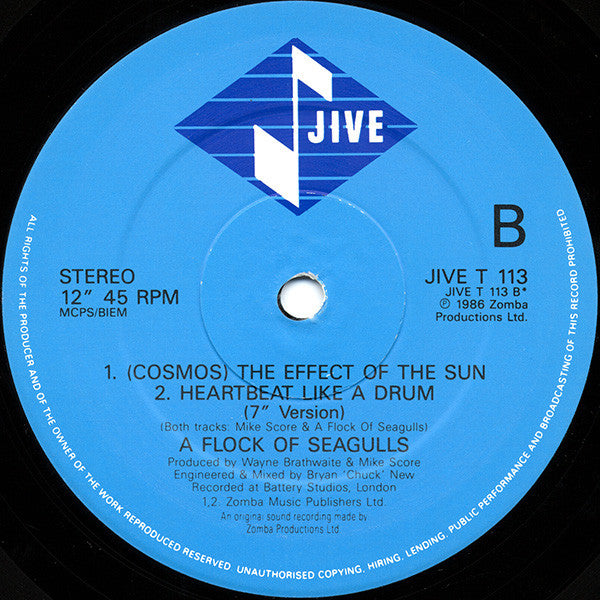 A Flock Of Seagulls : Heartbeat Like A Drum (12", Single)