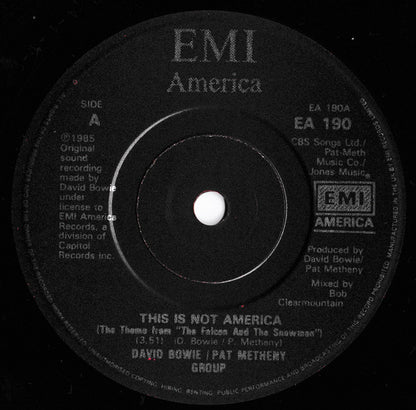 David Bowie / Pat Metheny Group : This Is Not America (Theme From The Motion Picture, The Falcon And The Snowman) (7", Single, Bla)