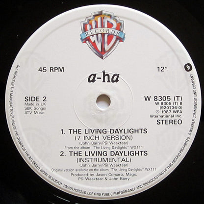 a-ha : The Living Daylights (Extended Mix) (12", Single, PRS)