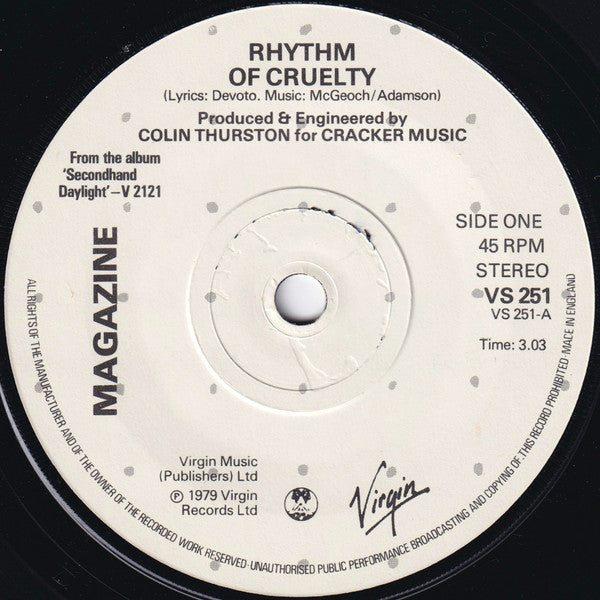 Magazine : Rhythm Of Cruelty (7", Single)